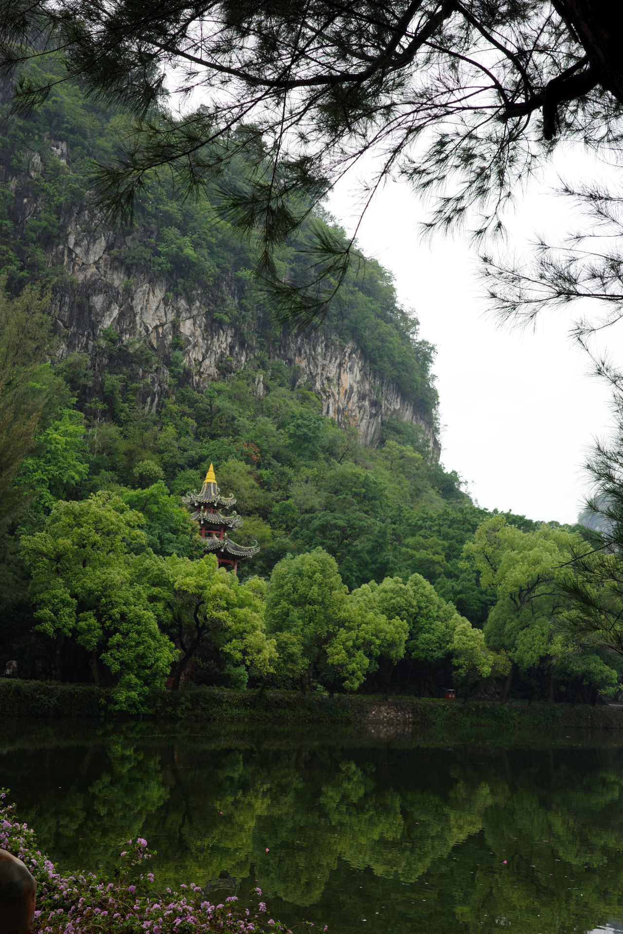 A pavilion visible through the trees